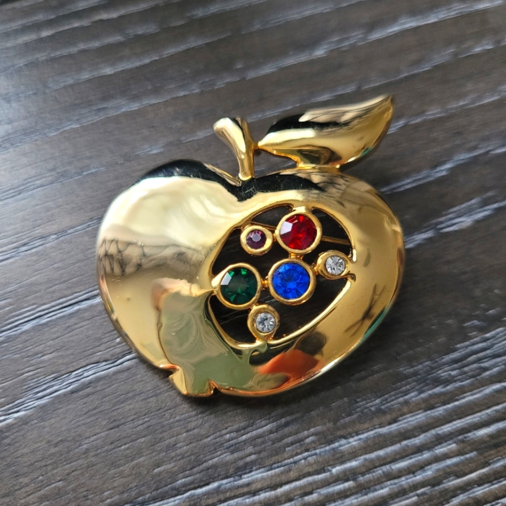 Vintage gold tone apple brooch with colorful bezel set rhinestones